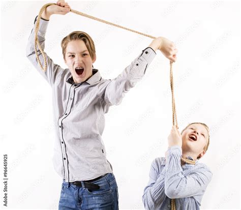 Young Teen Boys Fighting And Chocking With A Rope Stock Photo Adobe