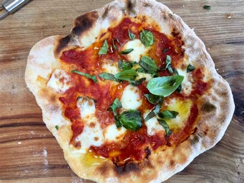 Season with salt and pepper. Easy Pizza Margherita Recipe Video • CiaoFlorentina