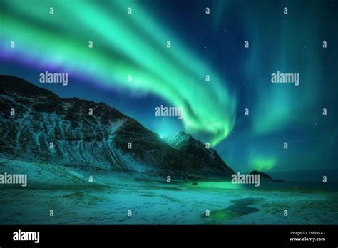 Aurora Borealis Above Beach In Lofoten Islands Norway Stock Photo Alamy
