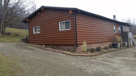 Cozy Transformation Log Cabin Siding Before And After