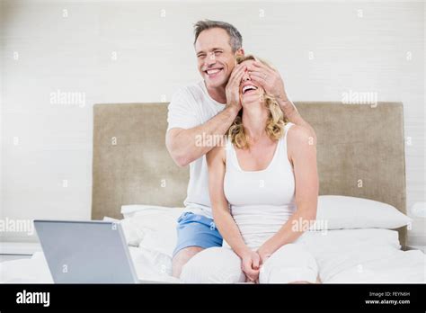 Husband Making A Surprise To Wife Stock Photo Alamy