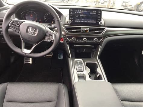 The Interior Of A Car Is Clean And Ready To Be Driven