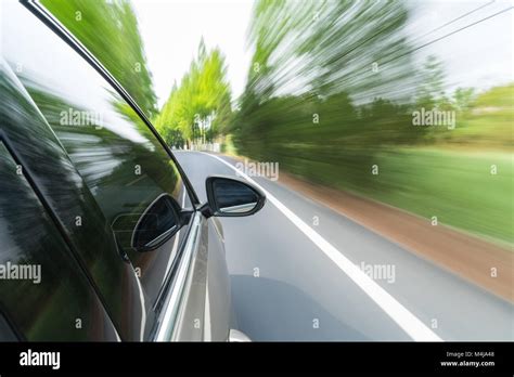 Car Driving With Green Motion Blur Stock Photo Alamy