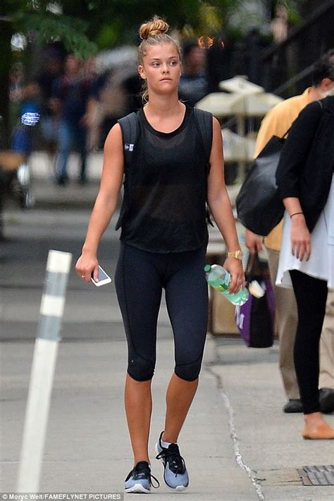 Nina Agdal Flashes Her Toned Abs In A Crop Top And Tight Leggings In