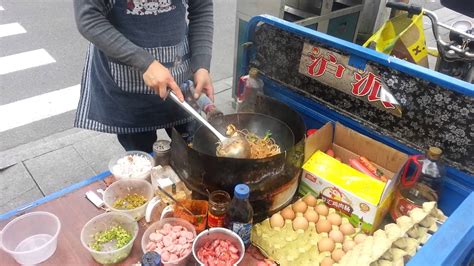 Our customers tasting chinese food. Me Ordering Street Food in Shanghai from the Master Street ...