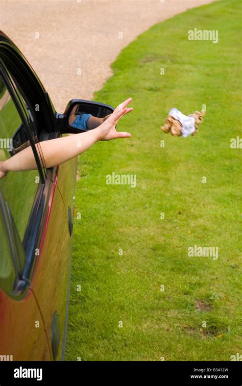Person Throwing Litter From Car Window Stock Photo Alamy