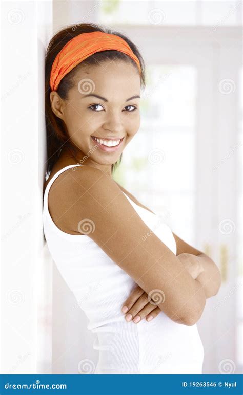 Portrait Of Laughing Ethnic Woman Stock Photo Image Of Casual Looking