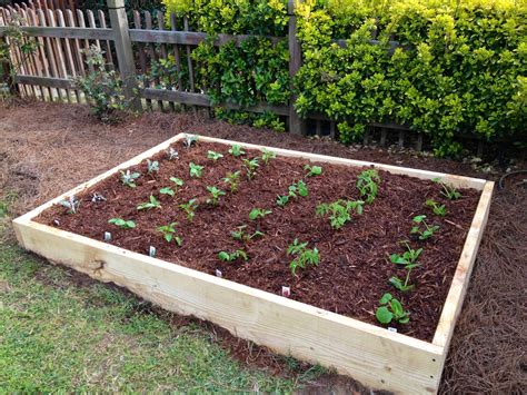 It's a generous 10 deep so you can grow big plants like tomatoes. Not So Newlywed McGees: DIY Raised Garden Bed