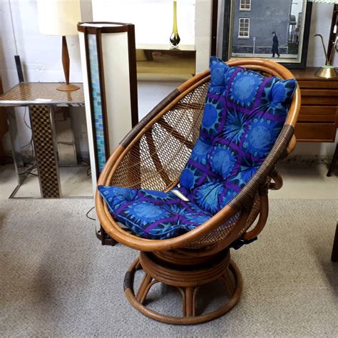 An english bamboo slipper chair from the late 19th century, with fan back, woven rattan seat and casters. FOUNDDESIGN » » Rattan Swivel Chair