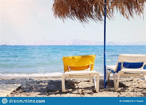 Holidays Image Of Tropical Sea And Beach Chairs Under Umbrellas Summer