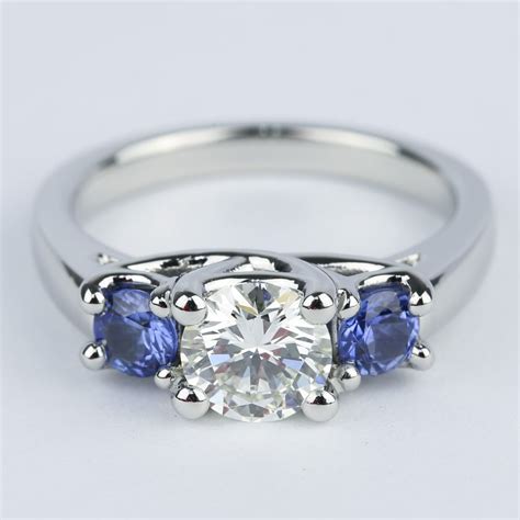 Three Stone Sapphire Engagement Ring And Center Diamond