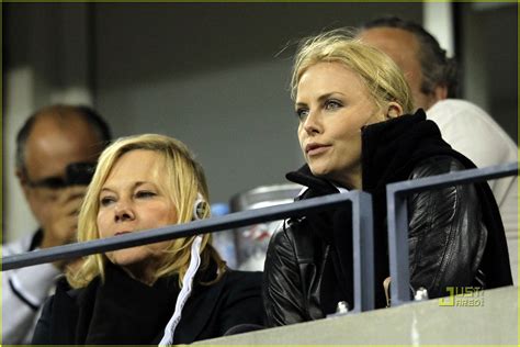 Charlize Theron Fashion S Night Out With Dior Photo