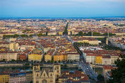 Cityscape Of Lyon Surrounded By Buildings And Greenery Under The