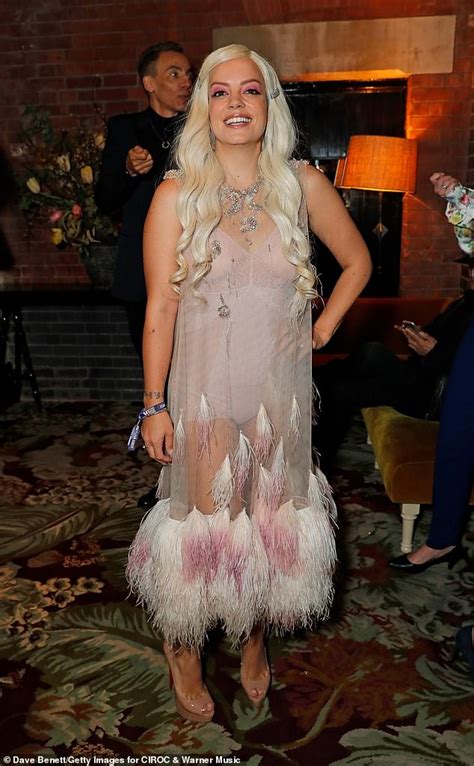 BRITs Lily Allen Rocks A Platinum Blonde Wig For Warner Music