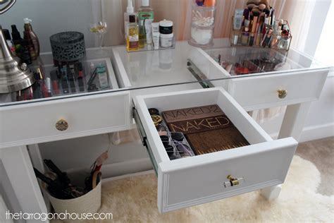 A glass table top over a graceful brown y, braced with white. Ana White | DIY Glass Top Vanity - DIY Projects