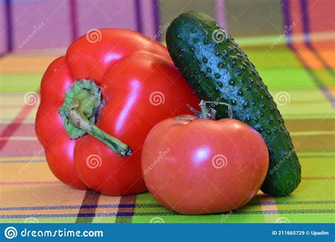 Fresh Vegetables Red Bell Pepper Tomato And A Cucumber Stock Image