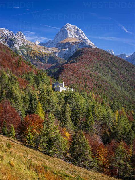 Slovenia Autumn Forest Surrounding Secluded Building In Triglav