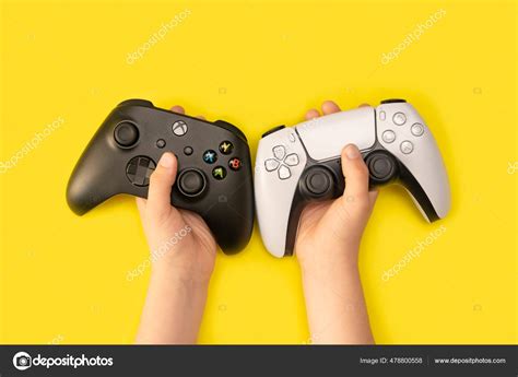 Kid Holding Xbox Series Playstation Controllers 15th Jun 2021 Sao