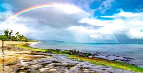 Rainbow Ove Beach At Laniakea On North Shore Of Oahu Stock Photo