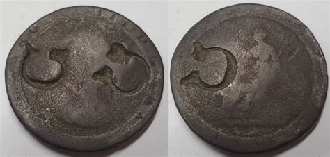 An Interestingly Marked Cartwheel Penny Coins