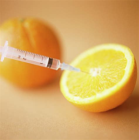 The royal society has produced an animation to explain the basic science of gm, compared to conventional plant breeding.read the full report here. Genetic Modification Of An Orange Photograph by Cristina ...