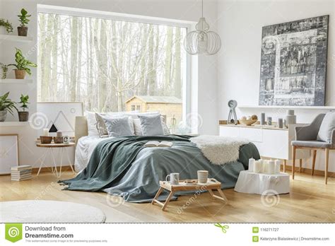 I like to mix cool and warm neutral tones (like grey, cream, taupe, etc) to bring the room together because almost anything can be added or removed without ruining the look. when you're shopping for a new blanket, make sure you keep your design and the aesthetic you want to create in mind. Pastel Warm Bedroom Interior Stock Image - Image of blue ...