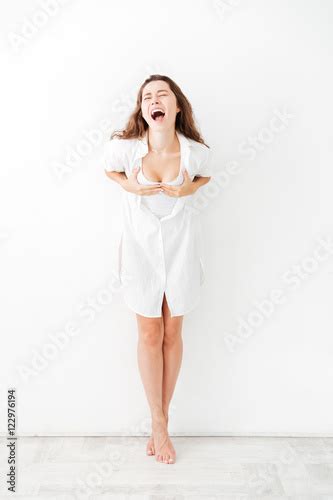 Charming Babe Woman Holding Her Breasts And Screaming Stock Photo Adobe Stock