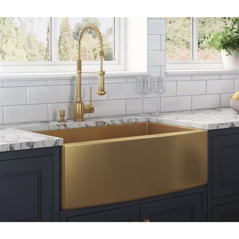The hammered copper farmhouse sink fits the mood of this traditional kitchen. Ruvati Farmhouse Apron-Front Stainless Steel 30 in. Single Bowl Kitchen Sink in Brass Tone Matte ...