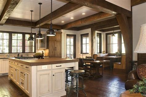 Inside, a linear foyer reveals a generous staircase with cascading landing. Rustic Lakehouse - kitchen - other metro - Wright Design ...
