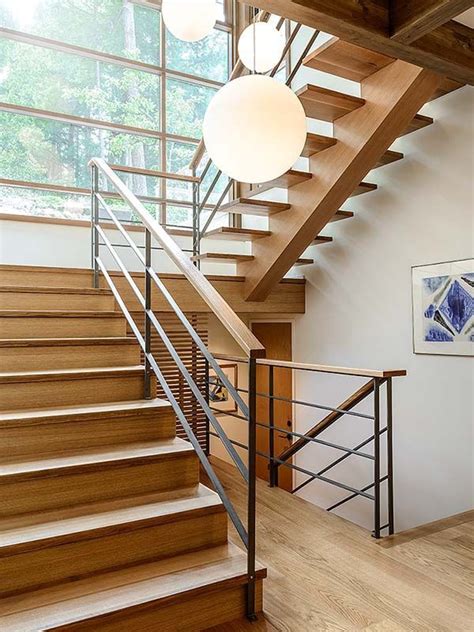 Modern staircase in foyer with lights and glass balustrade. New stair and railing ideas only in interioropedia.com | Modern staircase, Modern stairs ...
