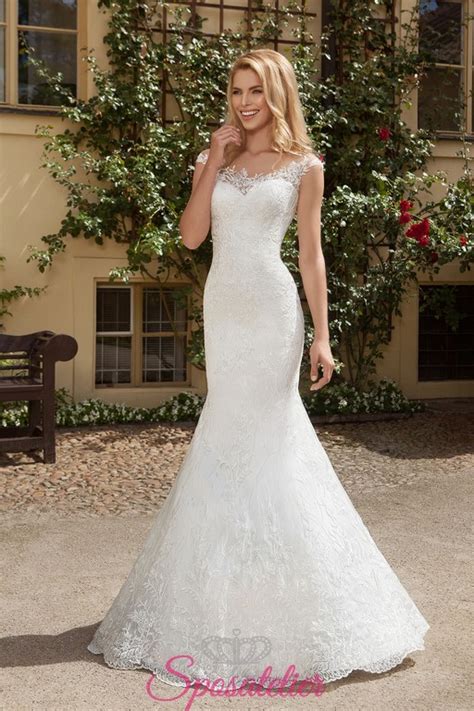 Lo strato superiore è fissato solo alla scollatura, e si muove con una leggerezza eterea. vestiti da sposa con gonna staccabile particolare ...