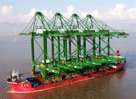 It has replaced them with st engineering and capitaland. ZPMC's latest tech cranes on the way to Singapore ...