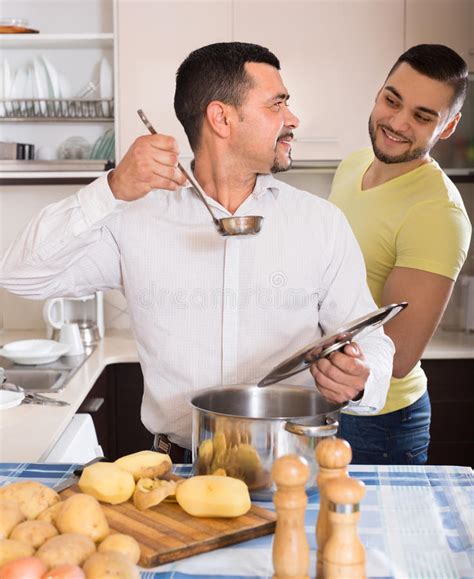 Two Men Cooking At Home Stock Image Image Of Domestic 53768735