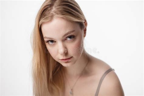Pretty Caucasian Girl With Naked Shoulders Looking At Camera Portrait