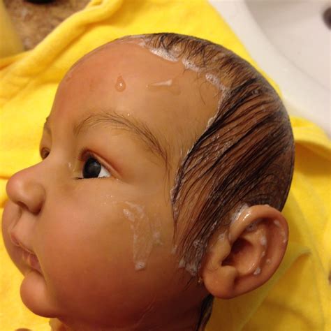 Slather on a conditioner or baby oil after shampooing once a week if hair is very dry. How to Care for a Lifelike Reborn Baby Doll - Custom Doll Baby