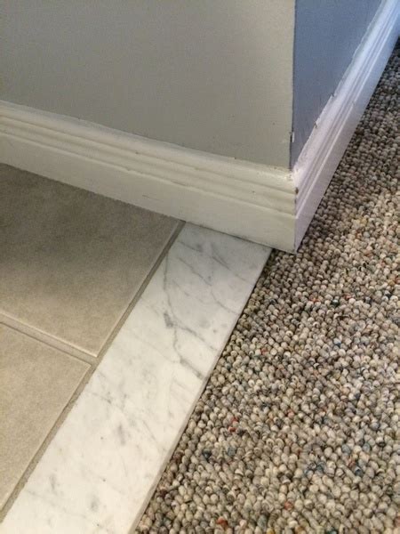I plan on laying vinyl planking that will transition into carpet. How Do I Remove This Marble Threshold? - Tiling, ceramics ...