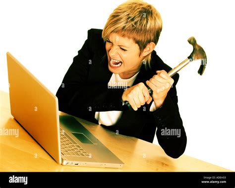 Frustrated Business Woman Smashing Computer With Hammer Stock Photo Alamy
