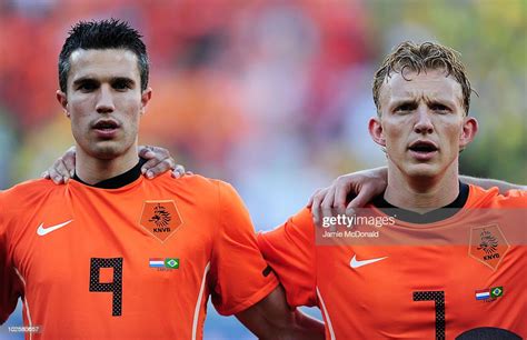 Robin Van Persie And Dirk Kuyt Of The Netherlands Sing Their National