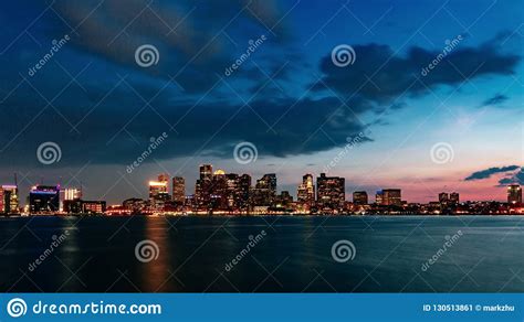 Skyline Of Downtown Boston Over Water At Sunset In Boston Usa Stock