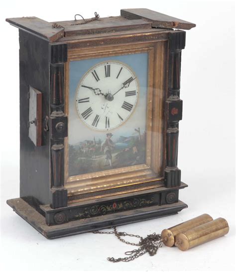 A Late 19th Century Black Forest Weight Driven Wall Clock With Ebonised Case Enclosing A 7