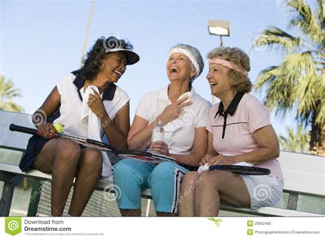 Senior Female Tennis Players Relaxing Stock Photo Image