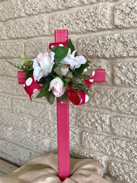 See the five components of a traditional burial at burialplanning.com. Cemetery Cross with flower arrangement, memorial cross, grave memorial, flowers for grave ...