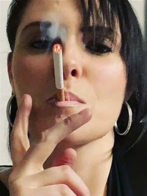 Woman Smoking Long Cigarette