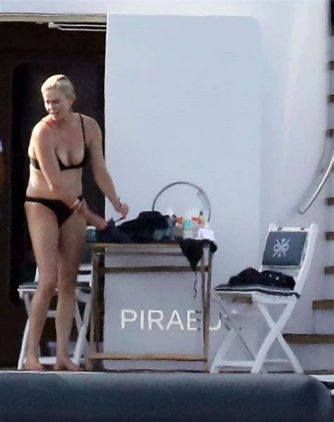 Charlize Theron Showed A Tight Ass In A Bikini While Relaxing On A