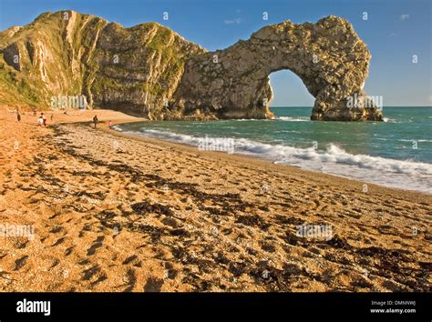 Durdle Door Is An Iconic Sea Arch Created By Coastal Erosion On Dorset