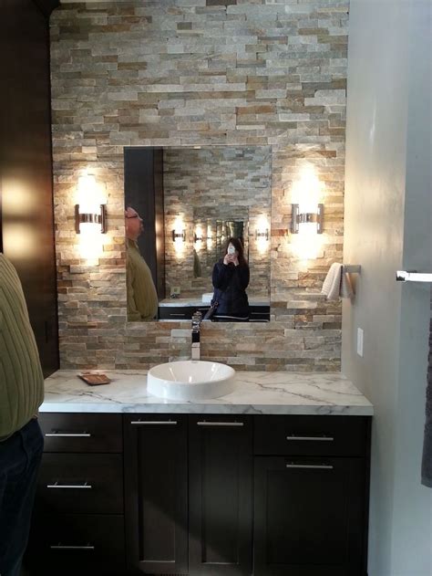 While this bathroom lacks ornaments and décor, the mosaic tiles as an accent wall is a strong statement. stone wall tile bathroom - Google Search | Wallpaper ...