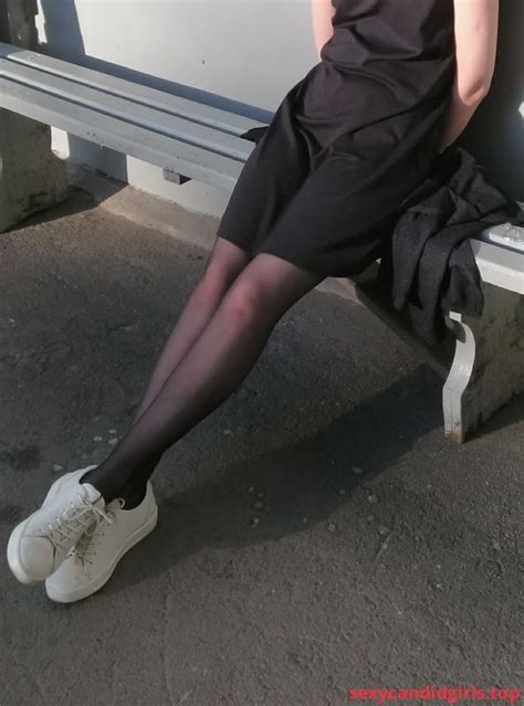 Sexycandidgirls Top Girl With Skinny Legs In Black Pantyhose Sitting On The Bus Stop Candid