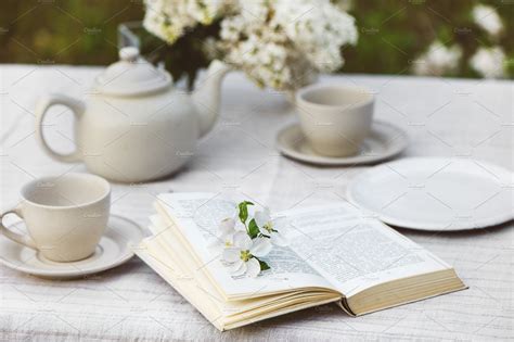 Open Book With Flowers Tea Cups Nature Stock Photos ~ Creative Market