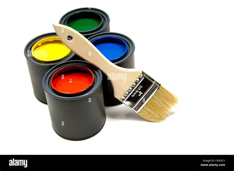 Four Primary Colored Cans Of Paint With A Paint Brush On White Background Stock Photo Alamy