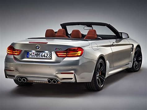 At the mention of convertibles, many people envision a soft top made of vinyl or cloth that folds to open the cabin. 2015 BMW M4 Convertible Photo Gallery
